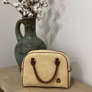 Vintage Etienne Aigner wicker purse. Great condition.